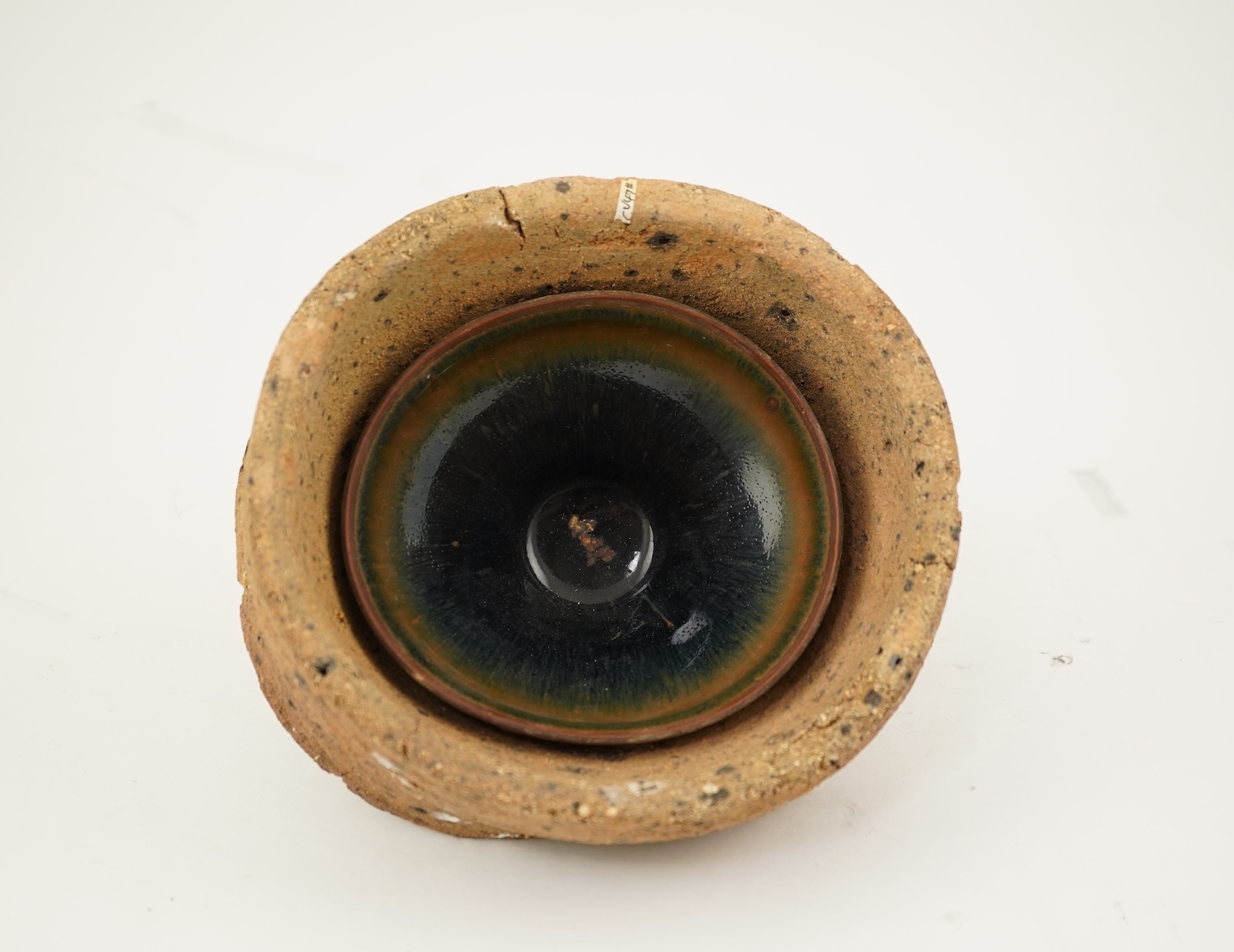 A Chinese Jian ware hare's fur bowl and saggar, Song dynasty